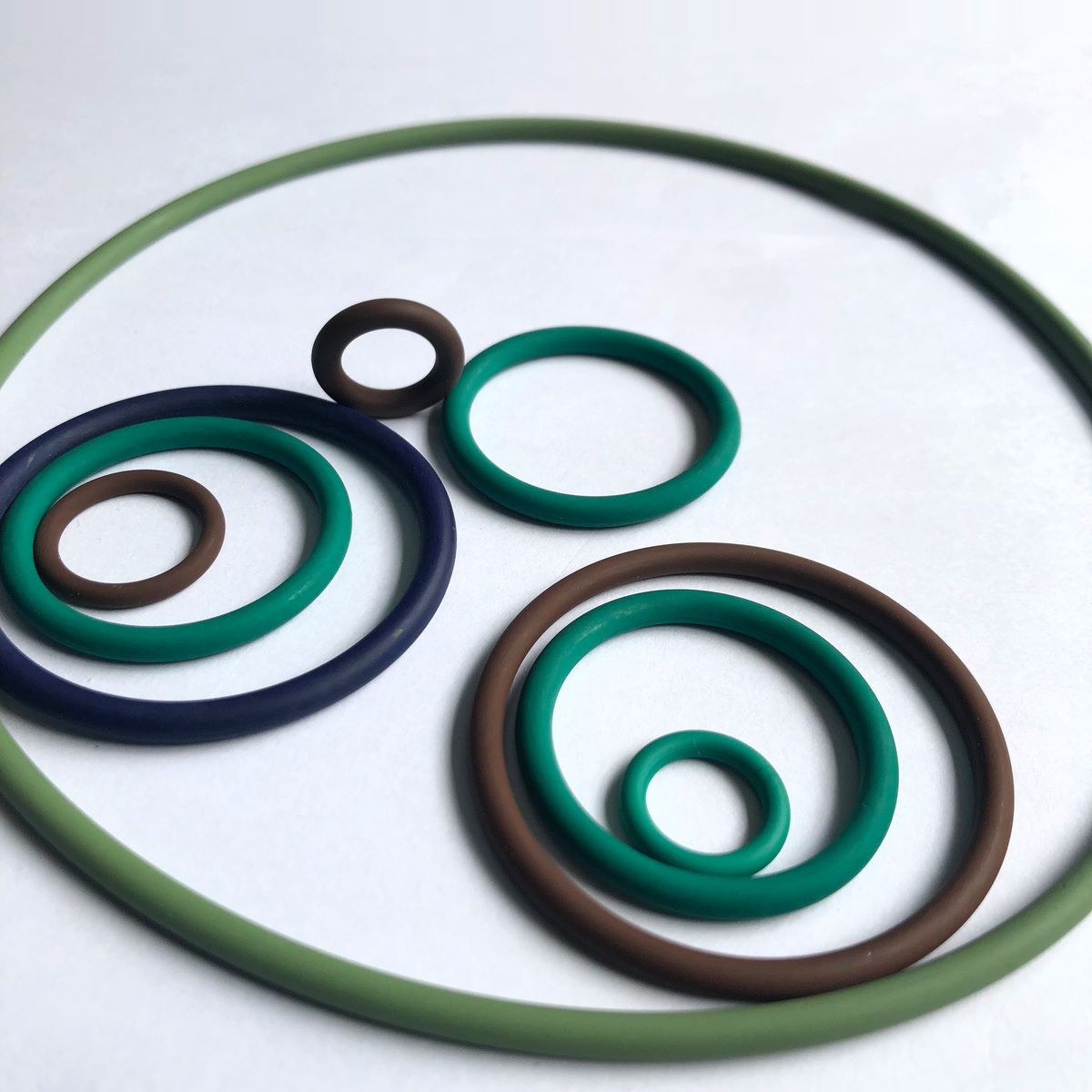 Nine coloured FKM O-rings in assorted sizes